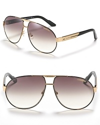 Carrera reenergizes the aviator sunglasses with a double bridge design. Logo-enhanced lens. With adjustable nose pads to help secure fit. Carrera reenergizes the aviator sunglasses with a double bridge design. Logo-enhanced lens. With adjustable nose pads to help secure fit.