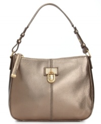 Make a move to the mini bag with this metallic must-have from Calvin Klein. Soft leather is accented with signature golden hardware, while the interior is outfitted with plenty of pockets to carry off all your day-to-night essentials. Make a move to the mini bag with this metallic must-have from Calvin Klein. Soft leather is accented with signature golden hardware, while the interior is outfitted with plenty of pockets to carry off all your day-to-night essentials.