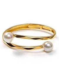 Gold makes an impact with Majorica's ripple bracelet finished with delicate pearl tips. Gold makes an impact with Majorica's ripple bracelet finished with delicate pearl tips.