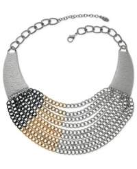 Painted color adds an artistic quality to this industrious bib necklace from GUESS. The silver tone chain bib features hematite and gold tone accents. Crafted in silver tone mixed metal. Approximate length: 15 inches + 2-inch extender. Painted color adds an artistic quality to this industrious bib necklace from GUESS. The silver tone chain bib features hematite and gold tone accents. Crafted in silver tone mixed metal. Approximate length: 15 inches + 2-inch extender.