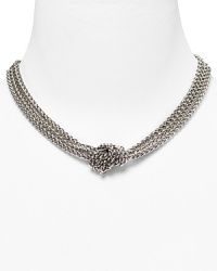 A chic silver-plated necklace with three braided rows and a chunky knot to cinch the look. A chic silver-plated necklace with three braided rows and a chunky knot to cinch the look.
