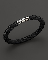 A bold mix of pebbled sterling silver and braided leather from the John Hardy Kali Collection. A bold mix of pebbled sterling silver and braided leather from the John Hardy Kali Collection.