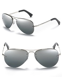 Sleek rimless aviator sunglasses with polarized lenses from Ray-Ban. Sleek rimless aviator sunglasses with polarized lenses from Ray-Ban.
