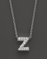 From the Tiny Treasures collection, a diamond Z necklace. With signature ruby accent. Designed by Roberto Coin. From the Tiny Treasures collection, a diamond Z necklace. With signature ruby accent. Designed by Roberto Coin.
