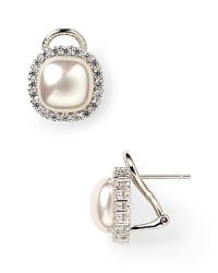 Flash back to glamour with these crystal-rimmed pearl earrings from Majorica, sure to add striking sparkle to occasion looks. Flash back to glamour with these crystal-rimmed pearl earrings from Majorica, sure to add striking sparkle to occasion looks.