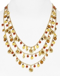 Lauren by Ralph Lauren channels exotic glamor with this tiered necklace. Crafted of 14 karat gold, its cascading charms and gorgeous, antique-effect stations have a far away feel. Lauren by Ralph Lauren channels exotic glamor with this tiered necklace. Crafted of 14 karat gold, its cascading charms and gorgeous, antique-effect stations have a far away feel.