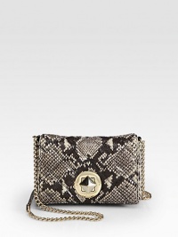 A quilted style in luxurious snake embossed leather with a chic chain strap.Chain shoulder strap, 22 dropTurnlock flap closureOne inside open pocketJacquard lining8W X 5H X 1½DImported A quilted style in luxurious snake embossed leather with a chic chain strap.Chain shoulder strap, 22 dropTurnlock flap closureOne inside open pocketJacquard lining8W X 5H X 1½DImported