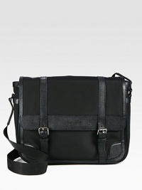 Tonal and textured mixed media create a sharp look. Flap with magnetic closureAdjustable shoulder strapInterior zip pocket94% polyamide/6% acrylic Fully lined 15¼W x 13¾H x 4¾D Imported Tonal and textured mixed media create a sharp look. Flap with magnetic closureAdjustable shoulder strapInterior zip pocket94% polyamide/6% acrylic Fully lined 15¼W x 13¾H x 4¾D Imported