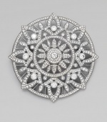 A circular design with a multi-leaf motif embellished in beautiful stones. Rhodium plated brassCrystalsCubic zirconiaSize, about 2½Pin backImported 