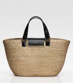 Woven straw design pairs with lustrous leather trim in this roomy carryall.Leather double top handles, 6 dropFlap-lock closureOne inside zip pocketFully lined13W X 11H X 5¼DMade in Italy