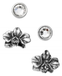Petite and precocious. Fossil's stud earrings set features a pair of intricate orchids and round-cut clear crystals in a bezel setting. Crafted in vintage silver tone mixed metal. Approximate diameters: 1/4 inch and 5/8 inch. Petite and precocious. Fossil's stud earrings set features a pair of intricate orchids and round-cut clear crystals in a bezel setting. Crafted in vintage silver tone mixed metal. Approximate diameters: 1/4 inch and 5/8 inch.