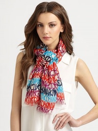This colorful style features bands of logo stripes and delicate eyelash-fringed edges.Modal47 X 67Dry cleanImported This colorful style features bands of logo stripes and delicate eyelash-fringed edges.Modal47 X 67Dry cleanImported