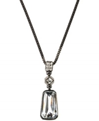 Dazzlingly dramatic. Glittering glass accents and crystals make a stunning statement on this pendant necklace from Givenchy. Crafted in hematite tone mixed metal, it adds sophisticated style to your evening ensemble. Approximate length: 16 inches + 2-inch extender. Approximate drop: 1-1/4 inches. Dazzlingly dramatic. Glittering glass accents and crystals make a stunning statement on this pendant necklace from Givenchy. Crafted in hematite tone mixed metal, it adds sophisticated style to your evening ensemble. Approximate length: 16 inches + 2-inch extender. Approximate drop: 1-1/4 inches.