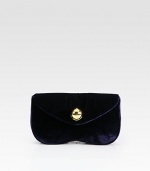 A sleek silhouette crafted in smooth velvet with an elegant flap-front closure. Magnetic flap closureTwo inside open pocketsSatin lining8¾W X 4¾H X 1¾DMade in Italy