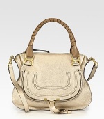 EXCLUSIVELY AT SAKS in Metallic Beige. Shimmering metallic calfskin leather covers this versatile shape, accented with elegantly-wrapped top handles in a contrasting tone. Double tennis-wrapped top handles, 6 dropShoulder strap, 18 dropTop zip closureHidden pocket under flapOne inside zip pocketOne inside open pocketCotton lining14½W X 10¾H X 4½DMade in Italy