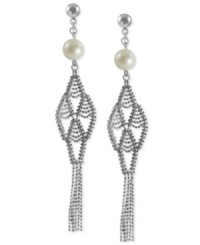 A brush with greatness. The tassels on these drop earrings lend a stylish touch, as do the cultured freshwater pearls (8-8-1/2 mm). Crafted from sterling silver with a rhodium finish. Approximate drop length: 3-1/5 inches. Approximate drop width: 5/8 inch. A brush with greatness. The tassels on these drop earrings lend a stylish touch, as do the cultured freshwater pearls (8-8-1/2 mm). Crafted from sterling silver with a rhodium finish. Approximate drop length: 3-1/5 inches. Approximate drop width: 5/8 inch.