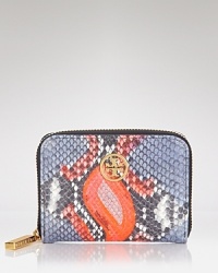 Keep the change with this Tory Burch coin purse, which works an exotic vibe in embossed leather. Its top zip closure opens to a lined interior with two compartments. Keep the change with this Tory Burch coin purse, which works an exotic vibe in embossed leather. Its top zip closure opens to a lined interior with two compartments.