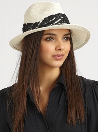 A sparkling style with a sequined zebra patterned band on a woven straw design. StrawSequinsBrim, about 2¾Hand washMade in USA of imported fabrics 