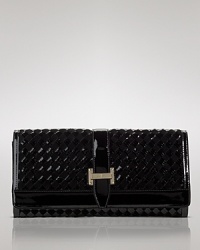 Move into tactile territory with Cole Haan's signature woven leather clutch. With a slim profile, this fuss-free bag adds on-trend elegance without effort. Move into tactile territory with Cole Haan's signature woven leather clutch. With a slim profile, this fuss-free bag adds on-trend elegance without effort.