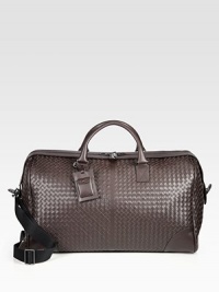An elegant and efficient travel companion, spacious enough to carry all of your essentials in style, crafted in woven Italian leather.Zip closureTop handlesRemovable shoulder strapInterior zip pocketLeather22W x 14H x 9DMade in Italy An elegant and efficient travel companion, spacious enough to carry all of your essentials in style, crafted in woven Italian leather.Zip closureTop handlesRemovable shoulder strapInterior zip pocketLeather22W x 14H x 9DMade in Italy