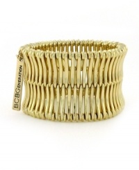 For a quick style pick-me-up, just add this dramatic BCBGeneration design to your digits. A linear-shaped band shines in rich gold tone mixed metal and displays the company logo. Bracelet stretches to fit wrist. For a quick style pick-me-up, just add this dramatic BCBGeneration design to your digits. A linear-shaped band shines in rich gold tone mixed metal and displays the company logo. Bracelet stretches to fit wrist.