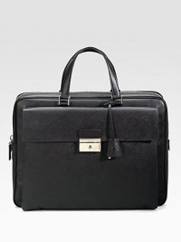 An elegant briefcase in textured saffiano leather with a large envelope exterior pocket. Zip closure Top handles Exterior pocket with clasp closure Interior zip pocket 15¾W X 12H X 2¼D Made in Italy An elegant briefcase in textured saffiano leather with a large envelope exterior pocket. Zip closure Top handles Exterior pocket with clasp closure Interior zip pocket 15¾W X 12H X 2¼D Made in Italy