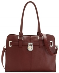 Opt for exquisite accessorizing with this city-sleek silhouette from Calvin Klein. Posh, golden hardware with belted detailing adorn the sumptuous leather, making this super spacious tote elegant and understated but big on style. Opt for exquisite accessorizing with this city-sleek silhouette from Calvin Klein. Posh, golden hardware with belted detailing adorn the sumptuous leather, making this super spacious tote elegant and understated but big on style.
