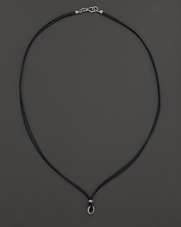 This sterling silver and Japanese cording necklace from Paul Morelli is the perfect backdrop for his meditation bell pendants. This sterling silver and Japanese cording necklace from Paul Morelli is the perfect backdrop for his meditation bell pendants.
