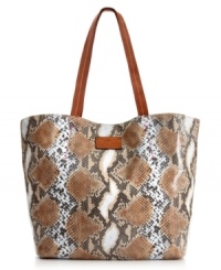 If you can't escape to that Spanish city by the sea, at least look the part with this posh python-embossed leather tote from Patricia Nash. The classic design features antique brass hardware and handcrafted stitching that lend a luxe look, while pockets and compartments offer excellent organization within. If you can't escape to that Spanish city by the sea, at least look the part with this posh python-embossed leather tote from Patricia Nash. The classic design features antique brass hardware and handcrafted stitching that lend a luxe look, while pockets and compartments offer excellent organization within.