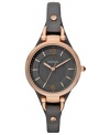 A thin leather strap holds a rosy-hued case on this unique Georgia collection watch by Fossil.