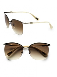 A sleek, semi-rimless style in sleek metal accented in glittering Swarovski crystals with a textured brow bar. Available in antique shiny brown with brown gradient lens or antique shiny gold with brown gradient lens. Swarovski crystals100% UV protectionMade in Italy A sleek, semi-rimless style in sleek metal accented in glittering Swarovski crystals with a textured brow bar. Available in antique shiny brown with brown gradient lens or antique shiny gold with brown gradient lens. Swarovski crystals100% UV protectionMade in Italy