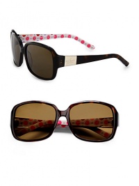 A classically shaped frame in lightweight acetate with a hidden, pop of pattern on the inner temples. Available in black with grey polarized lens or tortoise with brown polarized lens. Logo temples100% UV protectionImported A classically shaped frame in lightweight acetate with a hidden, pop of pattern on the inner temples. Available in black with grey polarized lens or tortoise with brown polarized lens. Logo temples100% UV protectionImported