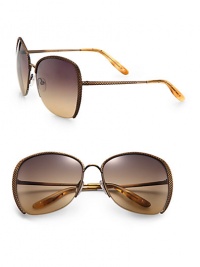 Get lost in these stylish, lightweight metal sunglasses with braided metal temples. Available in brass with brown gradient lens.Metal temples100% UV protectionMade in Italy