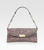 Make it an evening with this dazzling flap-front bag of glitter-encrusted cotton.Chain shoulder strap, 5¾ dropFlap snap closureOne inside zip pocketSix credit card slotsFully lined9¼W X 5¼H X 1DMade in Italy