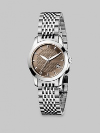 From the G-Timeless Collection. A beautiful design with a brown diamond pattern dial and a stainless steel link bracelet. Swiss quartz movementWater resistant to 5 ATMRound stainless steel case, 27mm (1) Smooth bezelBrown diamond pattern dial with markersDate display at 4 o'clockSecond hand Stainless steel link braceletMade in Switzerland From the G-Timeless Collection. A beautiful design with a brown diamond pattern dial and a stainless steel link bracelet. Swiss quartz movementWater resistant to 5 ATMRound stainless steel case, 27mm (1) Smooth bezelBrown diamond pattern dial with markersDate display at 4 o'clockSecond hand Stainless steel link braceletMade in Switzerland