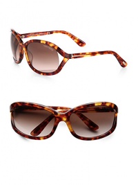 Refined plastic frames with floating lens and signature T logo temples. Available in light havana with brown gradient lens.Signature T logo temples100% UV protectionMade in Italy Refined plastic frames with floating lens and signature T logo temples. Available in light havana with brown gradient lens.Signature T logo temples100% UV protectionMade in Italy