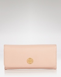 Loved for it's polished look, Tory Burch's continental wallet is an ever chic essential. With ten credit card pockets and an interior zip pocket, this latest piece from the NYC label offers the substance to match the style. Loved for it's polished look, Tory Burch's continental wallet is an ever chic essential. With ten credit card pockets and an interior zip pocket, this latest piece from the NYC label offers the substance to match the style.