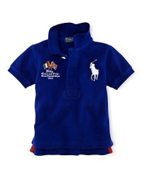 A preppy short-sleeved polo shirt in breathable cotton mesh is accented with country embroidery, celebrating Team USA's participation in the 2012 Olympics. A preppy short-sleeved polo shirt in breathable cotton mesh is accented with country embroidery, celebrating Team USA's participation in the 2012 Olympics.