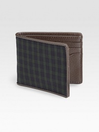 Made from the classic blackwatch tartan, the colors of a historic Scottish force, this bill holder is edged with boarskin embossed leather for a signature feel.One billfold compartmentSix cards slotsCotton/leather4W x 4HImported Made from the classic blackwatch tartan, the colors of a historic Scottish force, this bill holder is edged with boarskin embossed leather for a signature feel.One billfold compartmentSix cards slotsCotton/leather4W x 4HImported