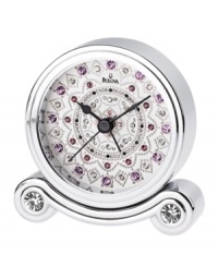 Sparkling crystals transform this bedside alarm clock from functional to fascinating. Chrome-finished metal case houses a white dial with hand-set pink and purple crystals and three black hands. Sparkling crystals transform this bedside alarm clock from functional to fascinating. Chrome-finished metal case houses a white dial with hand-set pink and purple crystals and three black hands.