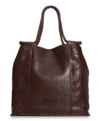 A classic tote has a wild side. Cool snakeskin-embossed print and signature detailing lend a luxe look, while the generous shape easily meets all your on or off duty demands. A classic tote has a wild side. Cool snakeskin-embossed print and signature detailing lend a luxe look, while the generous shape easily meets all your on or off duty demands.