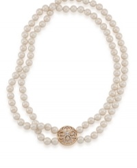 The epitome of elegance: Whether you wear it every day for work or save it for a special occasion, Carolee's double-strand pearl necklace is a timeless, elegant piece you'll cherish. Crafted with glass pearls and crystals (on the decorative closure) in gold tone mixed metal. Approximate length: 18 inches. The epitome of elegance: Whether you wear it every day for work or save it for a special occasion, Carolee's double-strand pearl necklace is a timeless, elegant piece you'll cherish. Crafted with glass pearls and crystals (on the decorative closure) in gold tone mixed metal. Approximate length: 18 inches.