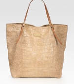 Rich, croc-embossed leather lends an exotic touch to this roomy carryall.Shoulder straps, 7 drop Magnetic top closure Protective metal feet One inside zip pocket Two inside open pockets Nylon lining 13½W X 14H X 6D Made in Italy