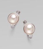 Glistening mabe pearl faceted in sterling silver makes for a timeless design. 10mm mabe pearl Sterling silver Drop, about ½ Ear wire back Made in Spain 