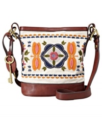 Inspired by Italian bags from the '70s, this classic carryall by Fossil evokes the feeling of an evening stroll through Piazza Navona. Unique floral embroidery, brass-tone hardware and sturdy leather shoulder strap make it the essential everyday accessory. Inspired by Italian bags from the '70s, this classic carryall by Fossil evokes the feeling of an evening stroll through Piazza Navona. Unique floral embroidery, brass-tone hardware and sturdy leather shoulder strap make it the essential everyday accessory.