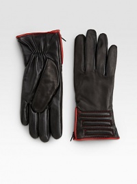 Toasty, fancy fingers in supple, padded leather design with side zipper, contrast stitching and touchscreen technology for easy access to electronics.About 8 longMicrofleece liningLeatherImported Toasty, fancy fingers in supple, padded leather design with side zipper, contrast stitching and touchscreen technology for easy access to electronics.About 8 longMicrofleece liningLeatherImported