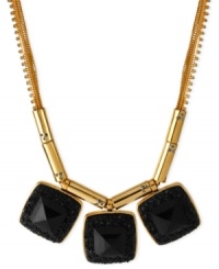 Kenneth Cole New York assembles an elegant frontal necklace with a post-modern bent. Crafted from gold-tone mixed metal, the necklace features tubes and chains as well as black accents for a daring look. Approximate length: 15 inches + 3-inch extender. Approximate drop: 1-1/2 inches. Kenneth Cole New York assembles an elegant frontal necklace with a post-modern bent. Crafted from gold-tone mixed metal, the necklace features tubes and chains as well as black accents for a daring look. Approximate length: 15 inches + 3-inch extender. Approximate drop: 1-1/2 inches.