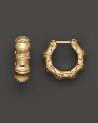 Bold bamboo hoops, rendered in richly gleaming 18K yellow gold. Bold bamboo hoops, rendered in richly gleaming 18K yellow gold.