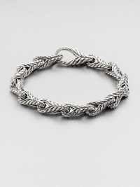 With impeccable sculpting and attention to detail, this 8-link bracelet of sterling silver makes the ultimate statement in signature style.Sterling silverLobster claspAbout 9 diam.Made in USA With impeccable sculpting and attention to detail, this 8-link bracelet of sterling silver makes the ultimate statement in signature style.Sterling silverLobster claspAbout 9 diam.Made in USA