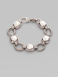 From the Silver Rocks Collection. This stunning piece features large faceted sterling silver rocks and pretty circle links. Sterling silver Lobster clasp closure Diameter, about 2¼ Imported From the Silver Rocks Collection. This stunning piece features large faceted sterling silver rocks and pretty circle links. Sterling silver Lobster clasp closure Diameter, about 2¼ Imported